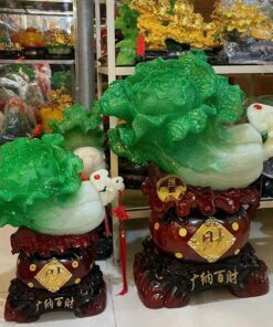 Tượng Bắp Cải Xanh Đặt Trên Túi Tiền Phong Thủy
